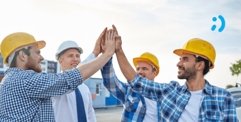 group of techs doing high fives